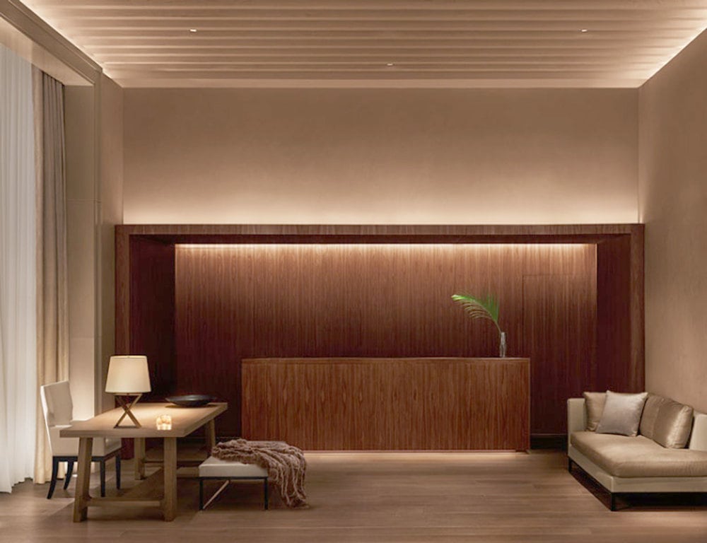 wooden reception furniture at the Edition Hotel in London