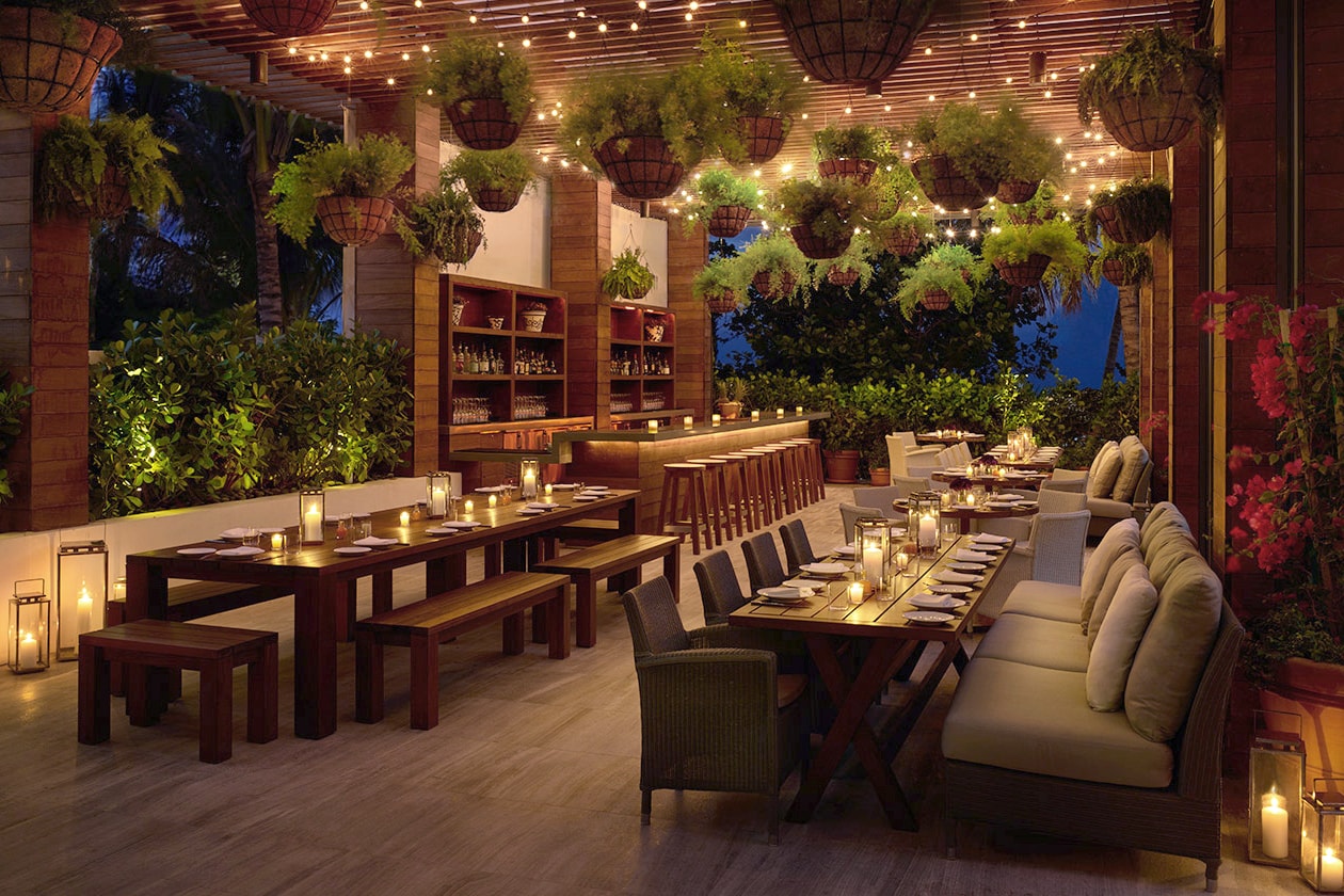 restaurant outdoor furniture - communal tables at a Miami edition hotel