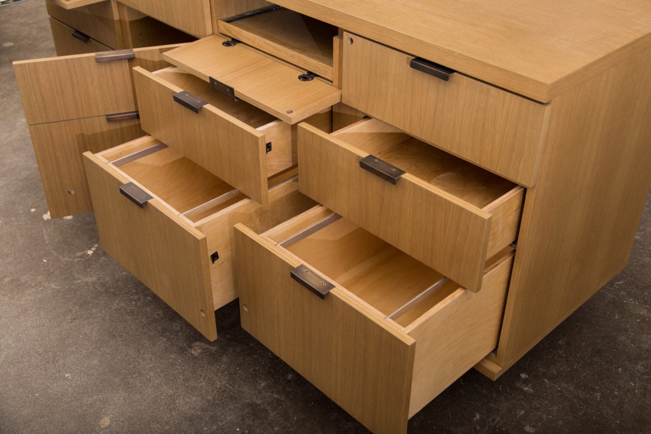 bespoke solid wood furniture - wood dresser at an angle with drawers and doors open