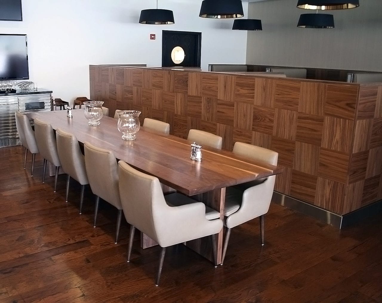 bespoke restaurant furniture - communal table with armchairs