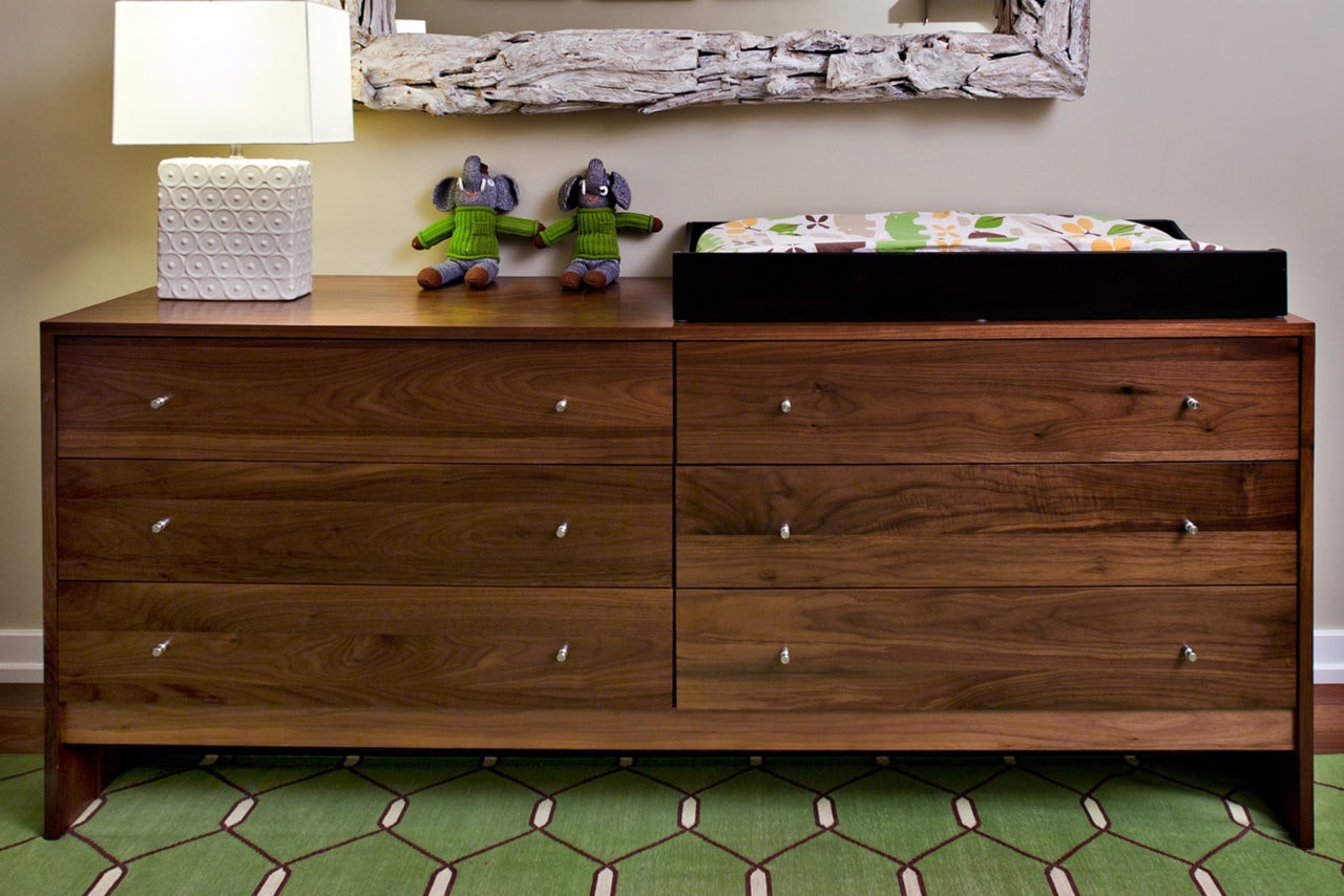 a SENTIENT contemporary designed custom solid wood dresser in walnut wood with six drawers and chrome drawer pulls
