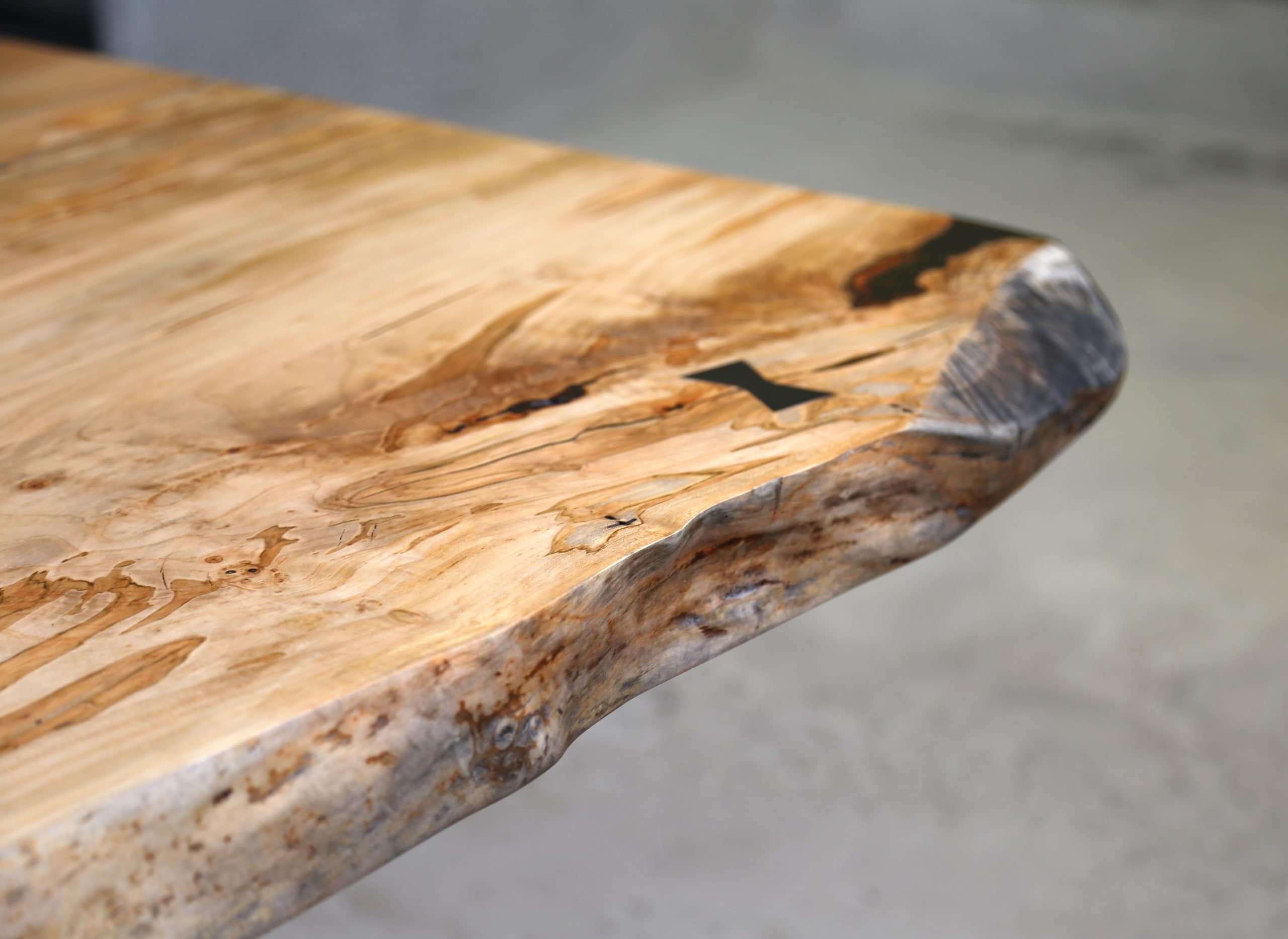 modern waterfall dining table in maple
