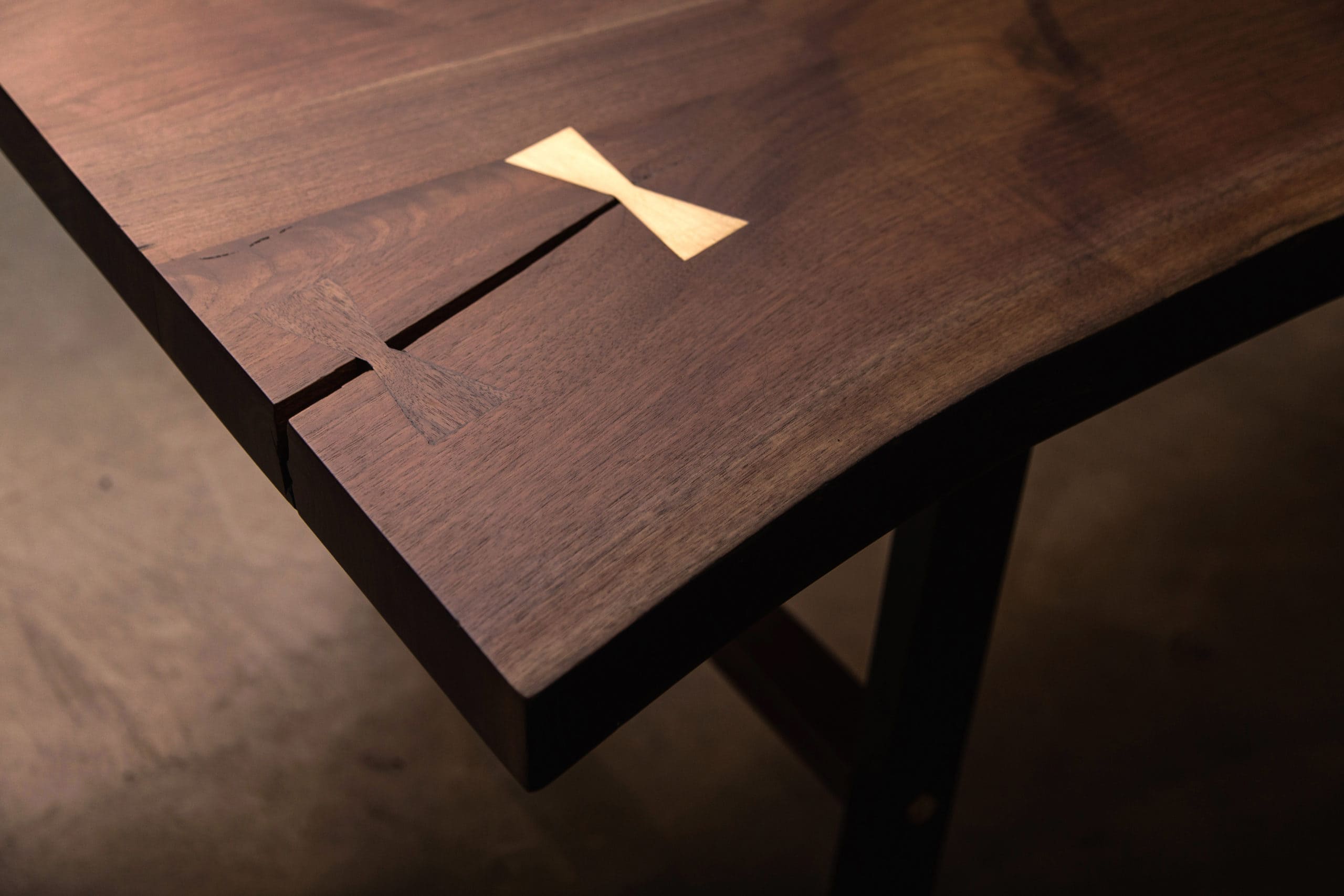walnut live edge table top with inlay joinery