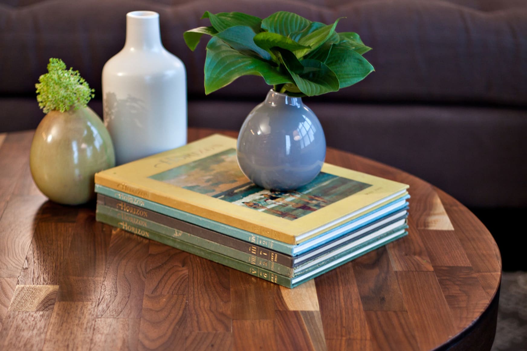 black wood coffee table with round design