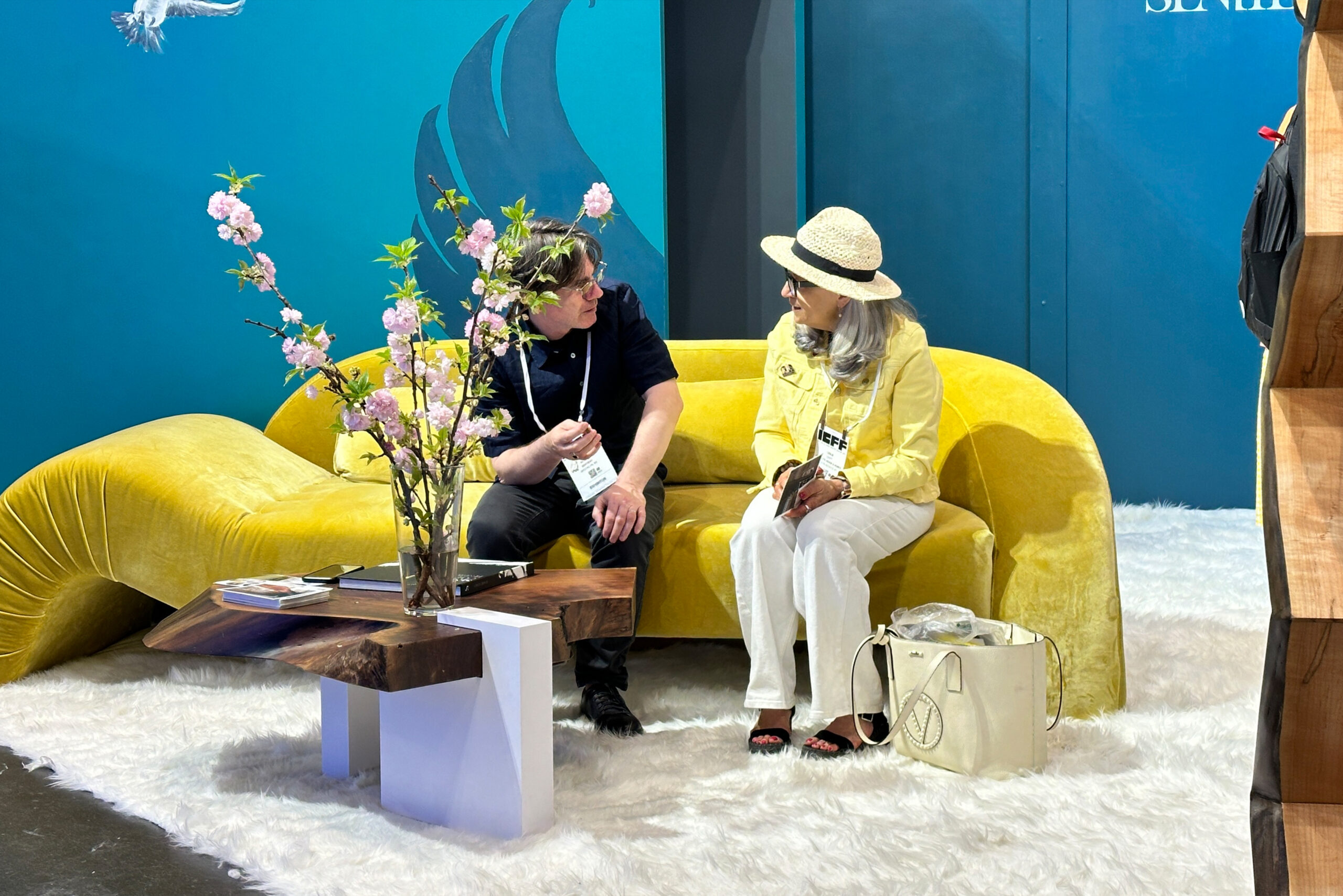 Sentient Aeon Sofa at ICFF The Sentient Aeon Sofa, upholstered in yellow velvet, exhibited at ICFF, offering a striking statement piece for modern living spaces.