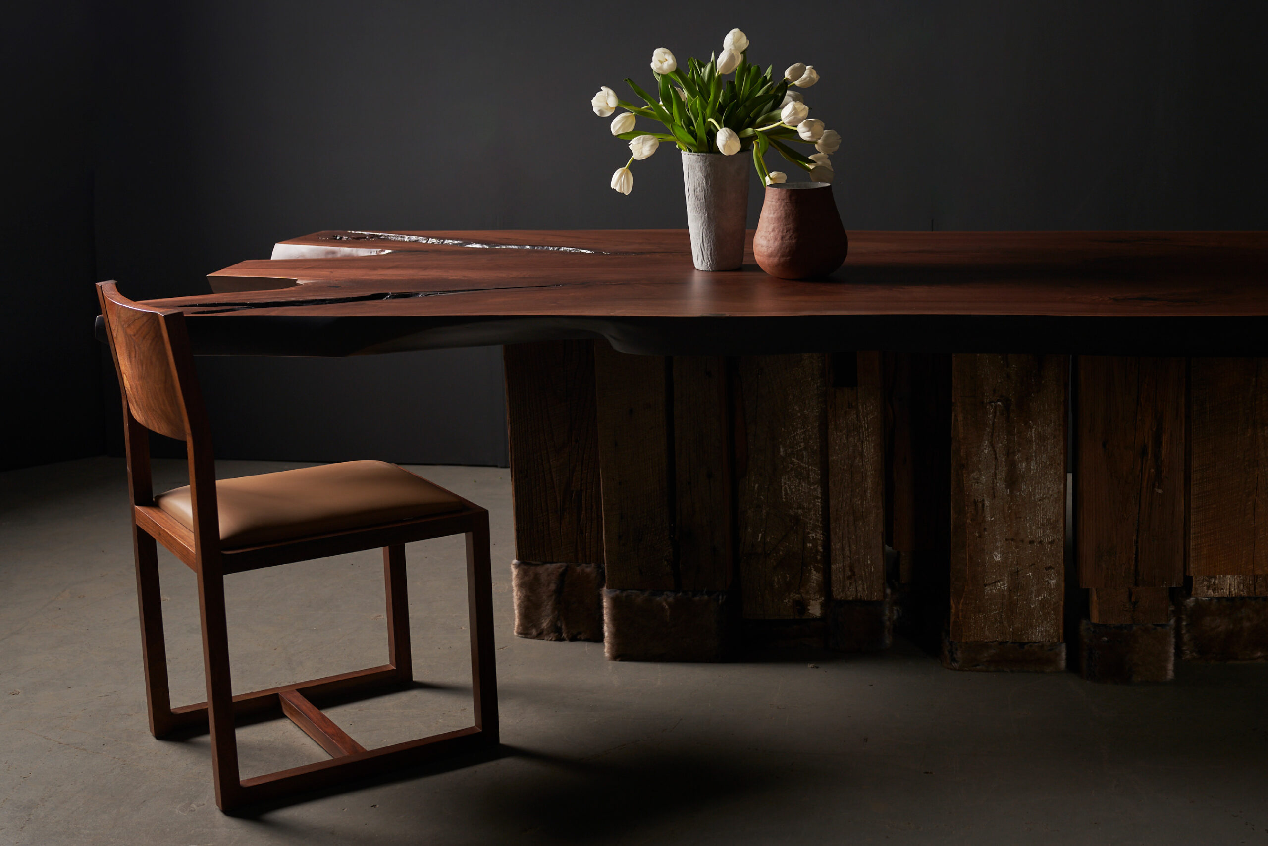SENTIENT Evolution Artistic Live Edge Table - Side View A side angle of the SENTIENT Evolution live edge table, emphasizing its organic form and custom wooden craftsmanship.