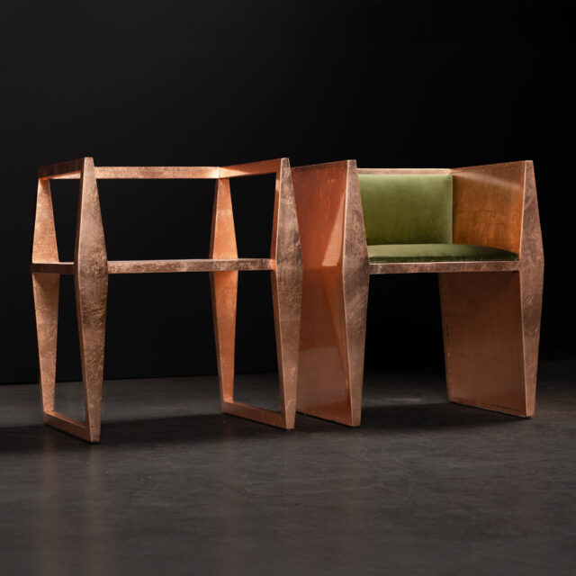 A pair of SENTIENT Sapience Chairs featuring an original version and a frame version in a striking copper leaf finish with a green upholstered seat.